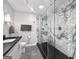 Elegant bathroom featuring a marble shower, modern fixtures, and stylish design at 102 Pinegate Rd, Peachtree City, GA 30269