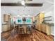 Kitchen with an island with seating and stainless steel appliances at 102 Pinegate Rd, Peachtree City, GA 30269