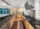 Kitchen with stainless steel appliances, stone countertops, and hardwood floors at 102 Pinegate Rd, Peachtree City, GA 30269