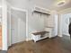 Practical mud room featuring storage, a bench, and easy access to the home's interior at 102 Pinegate Rd, Peachtree City, GA 30269