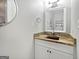 Stylish powder room with unique vanity and elegant fixtures; a convenient space at 102 Pinegate Rd, Peachtree City, GA 30269