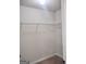 Walk-in closet featuring standard wire shelving and neutral colored walls at 276 Arborview Dr, Mcdonough, GA 30252