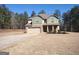 Inviting two-story home boasts a two-car garage, and well-manicured landscaping at 276 Arborview Dr, Mcdonough, GA 30252