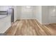 A formal dining room with modern lighting and new hard surface flooring at 2725 St Augustine Trl, Marietta, GA 30067