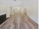 Spacious open-concept layout showcasing hardwood floors, fireplace, and bright lighting at 2725 St Augustine Trl, Marietta, GA 30067