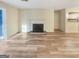 Bright living room features a fireplace and new hard surface flooring at 2725 St Augustine Trl, Marietta, GA 30067