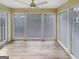 Inviting sunroom featuring many windows and abundant natural light at 2725 St Augustine Trl, Marietta, GA 30067