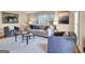 Cozy living room with neutral tones, plush seating, and natural light from the window at 3736 Bloxham Ct, Atlanta, GA 30341