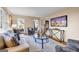 Comfortable living room featuring stylish furniture, a soft rug, and a modern console table at 3736 Bloxham Ct, Atlanta, GA 30341