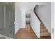 Inviting entryway with hardwood floors and staircase leading to the upper level at 3232 Tarian Way, Decatur, GA 30034
