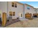 This is a view of a backyard with a small patio, fence, and an air conditioning unit at 3232 Tarian Way, Decatur, GA 30034