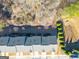 Overhead view of townhome roofs and surrounding trees at 3232 Tarian Way, Decatur, GA 30034