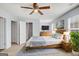 Staged primary bedroom with a bed, dresser, and natural light at 3232 Tarian Way, Decatur, GA 30034