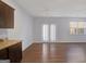 Spacious living room with wood floors, ceiling fans, and sliding glass doors at 3232 Tarian Way, Decatur, GA 30034
