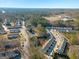 An aerial view of the community, nestled amongst lush trees, showcasing the neighborhood at 3232 Tarian Way, Decatur, GA 30034