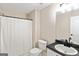 Bathroom featuring a shower and vanity with black hardware at 261 Whistle Way, Locust Grove, GA 30248
