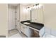 Bathroom with dual sinks and vanity at 261 Whistle Way, Locust Grove, GA 30248