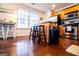 Bright kitchen area with wooden cabinets, stainless appliances and open layout at 5790 Ridge Stone Way, Cumming, GA 30041