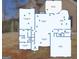 Detailed floor plan of the home's first floor, showcasing the layout and room sizes, with a back patio and garage at 224 Jester Ct, Mcdonough, GA 30252