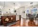 Modern kitchen with an island, stainless steel dishwasher, pendant lighting, and breakfast area at 224 Jester Ct, Mcdonough, GA 30252