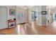 Bright foyer with decorative glass door, hardwood floors, and traditional furnishings at 130 Kingsbrooke Cir, Palmetto, GA 30268