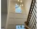 Grand foyer showcasing soaring ceilings, accent wall, and an elegant chandelier creating a dramatic entrance at 5106 N Pratt St, Covington, GA 30014