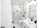 Charming bathroom featuring a glass-enclosed shower, modern vanity, and stylish accents, creating a relaxing space at 2508 Sylvan Rd, East Point, GA 30344