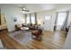 A stylish living room with a cozy seating arrangement and wood floors at 2508 Sylvan Rd, East Point, GA 30344