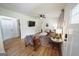 Sunlit living room showcasing an open space and seamless flow into other areas at 2508 Sylvan Rd, East Point, GA 30344