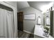 Bright bathroom showcasing modern lighting, a spacious vanity, and elegant decor at 128 Turner Ln, Bowdon, GA 30108