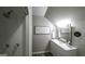 Bathroom highlighting a shower, modern vanity, and stylish 'Be Our Guest' decor at 128 Turner Ln, Bowdon, GA 30108
