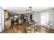 Open kitchen featuring a large island and view of the dining area with natural light at 128 Turner Ln, Bowdon, GA 30108