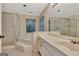 Elegant bathroom showcasing a tub, glass shower, and double vanity at 233 Spear Rd, Fayetteville, GA 30215