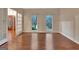 Entry way with hardwood floors, view of the front door and view of the front yard at 233 Spear Rd, Fayetteville, GA 30215