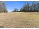 Expansive backyard showing the vast open space and potential for outdoor activities and recreation at 623 Swan Lake Rd, Stockbridge, GA 30281