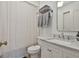 Bathroom featuring a marble vanity, neutral color palette, with gray towels, and shower with a white curtain at 375 Darren Dr, Fayetteville, GA 30215