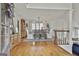 Bright dining room featuring hardwood floors, a large window, and stylish decor at 375 Darren Dr, Fayetteville, GA 30215