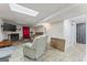 Cozy basement living area with a fireplace, tv, and comfortable seating, perfect for relaxing or entertaining at 2545 Rockbridge Nw Rd, Conyers, GA 30012