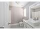 Bathroom featuring vanity with rectangular sink, white cabinets, and geometric-patterned tile floor at 505 Phillips Dr, Palmetto, GA 30268