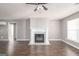 Bright living room with fireplace, wood flooring and neutral paint palette at 505 Phillips Dr, Palmetto, GA 30268