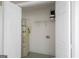 A utility closet with white shelving and a hot water tank at 505 Phillips Dr, Palmetto, GA 30268