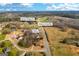 McDonough, GA aerial view of a home on Honey Creek Road with a large field across the street at 603 Honey Creek Rd, Mcdonough, GA 30252