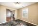 Dining room with stone tile flooring, and a view into the living area at 603 Honey Creek Rd, Mcdonough, GA 30252