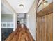 Inviting foyer with hardwood floors and view of the living area with fireplace at 603 Honey Creek Rd, Mcdonough, GA 30252