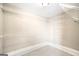 Well-organized walk-in closet with multiple shelves for optimal storage at 603 Honey Creek Rd, Mcdonough, GA 30252