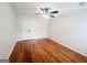 Bedroom featuring a ceiling fan, hardwood flooring, and a closet with double doors at 2019 Chelton Se Way, Smyrna, GA 30080