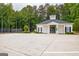 View of a single-story community building with parking spaces at 88 Harbour Lake Dr, Fayetteville, GA 30215