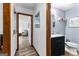 Hallway bathroom that offers plenty of privacy, with a clean sink, toilet and counterspace at 108 Everhill, Peachtree City, GA 30269