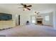 Spacious living room features a stone fireplace and abundant natural light at 5687 Highway 212 N, Covington, GA 30016