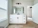 Modern bathroom with sleek vanity and a glimpse of bedroom at 242 Deerfield Dr, Jonesboro, GA 30238